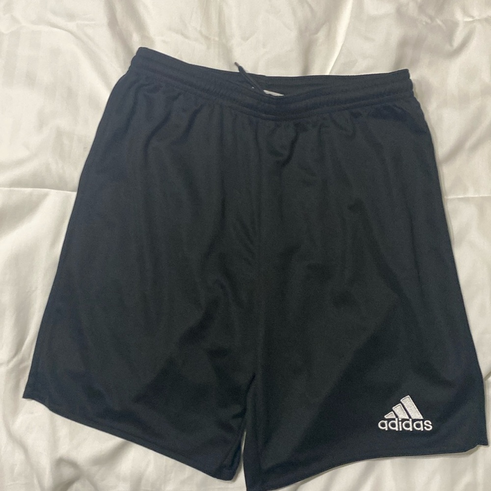 Adidas youth size large black mesh active shorts.